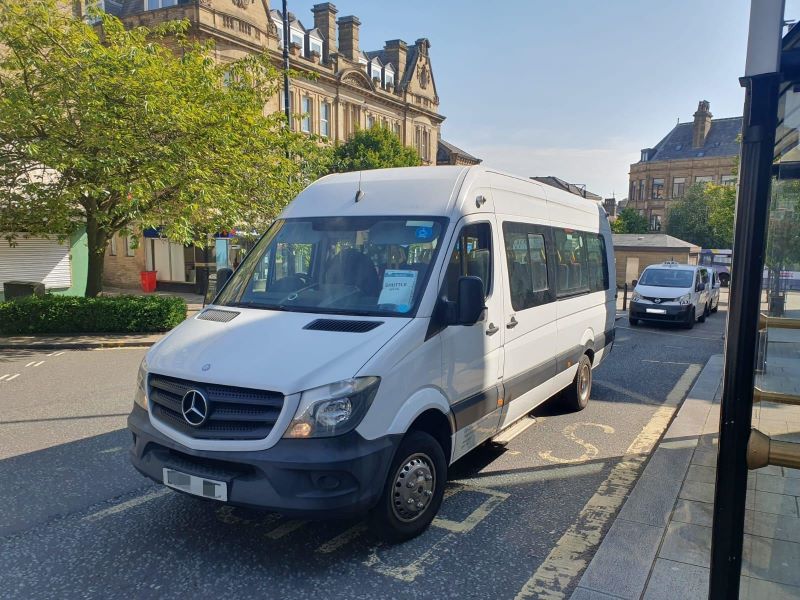 The free shuttle bus parked at George Street, Halifax.